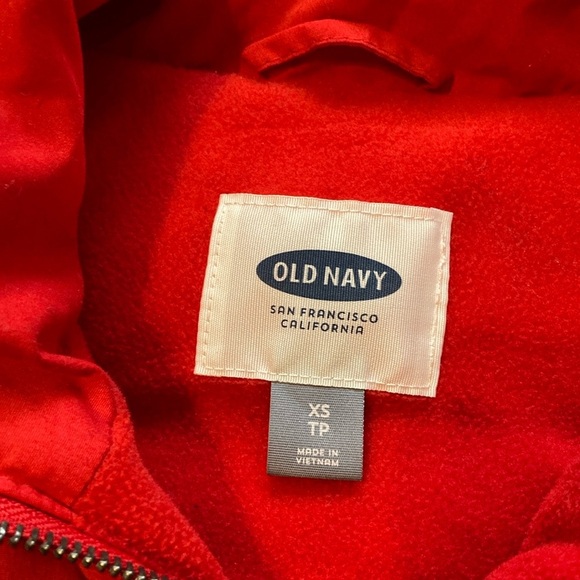Old Navy women’s Red Puffer Vest with fleece lining. - Picture 2 of 7